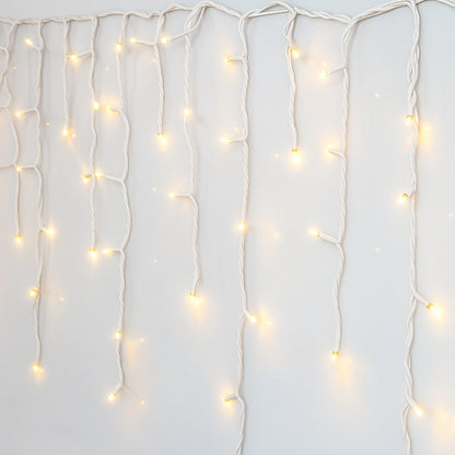 Instalație LED Franjuri inegale 12×0.7m Fir gros, Interconectabila Lumina Calda, pentru Exterior și Interior, Decor Crăciun