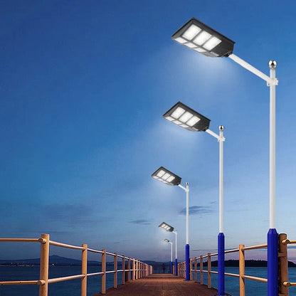 Set 2x Lampi Solare LED, Jortan, 600W, cu incarcare solara, panou fotovoltaic, senzor de miscare, suport metalic, telecomanda